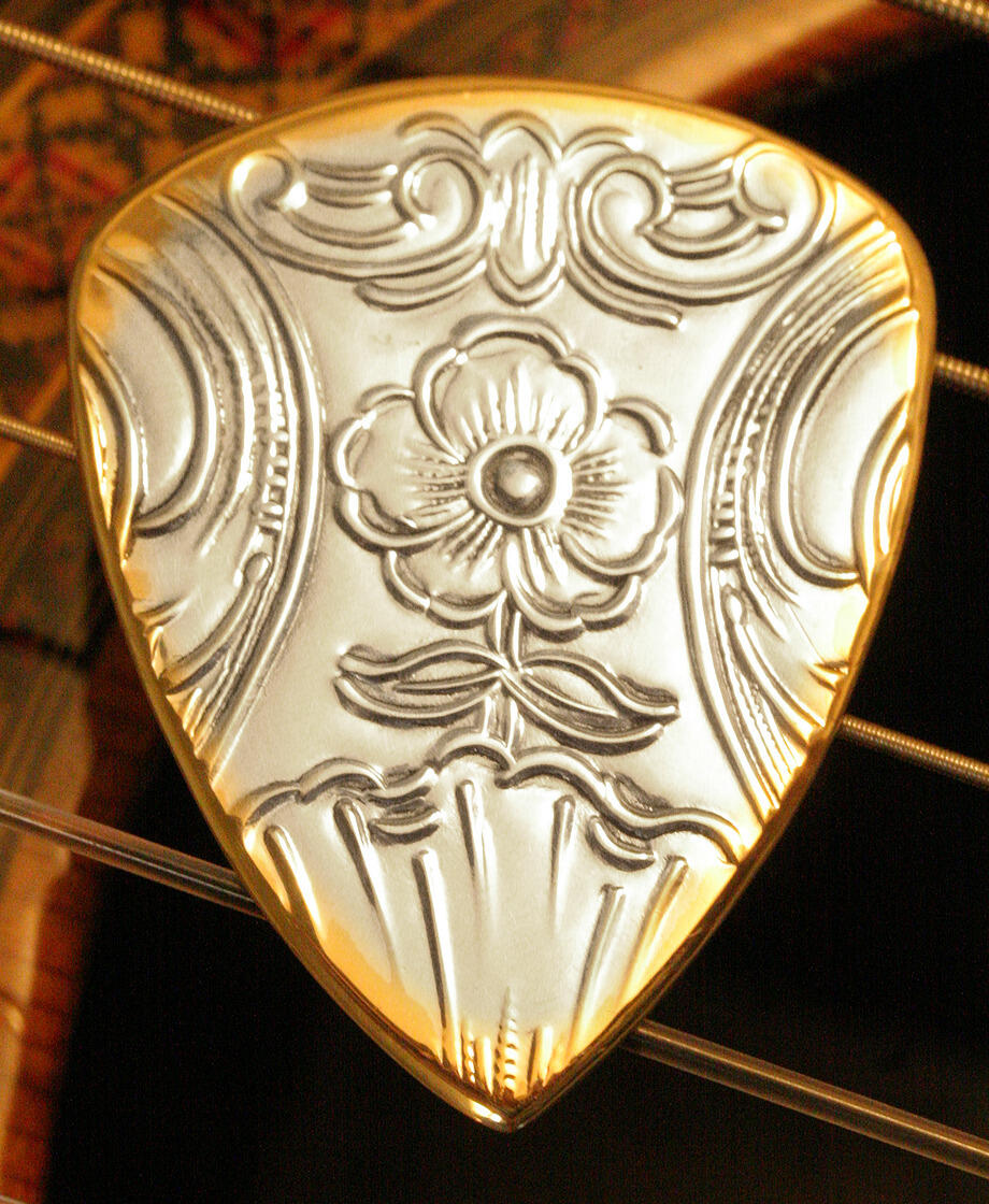 silver brass metal guitar pick
