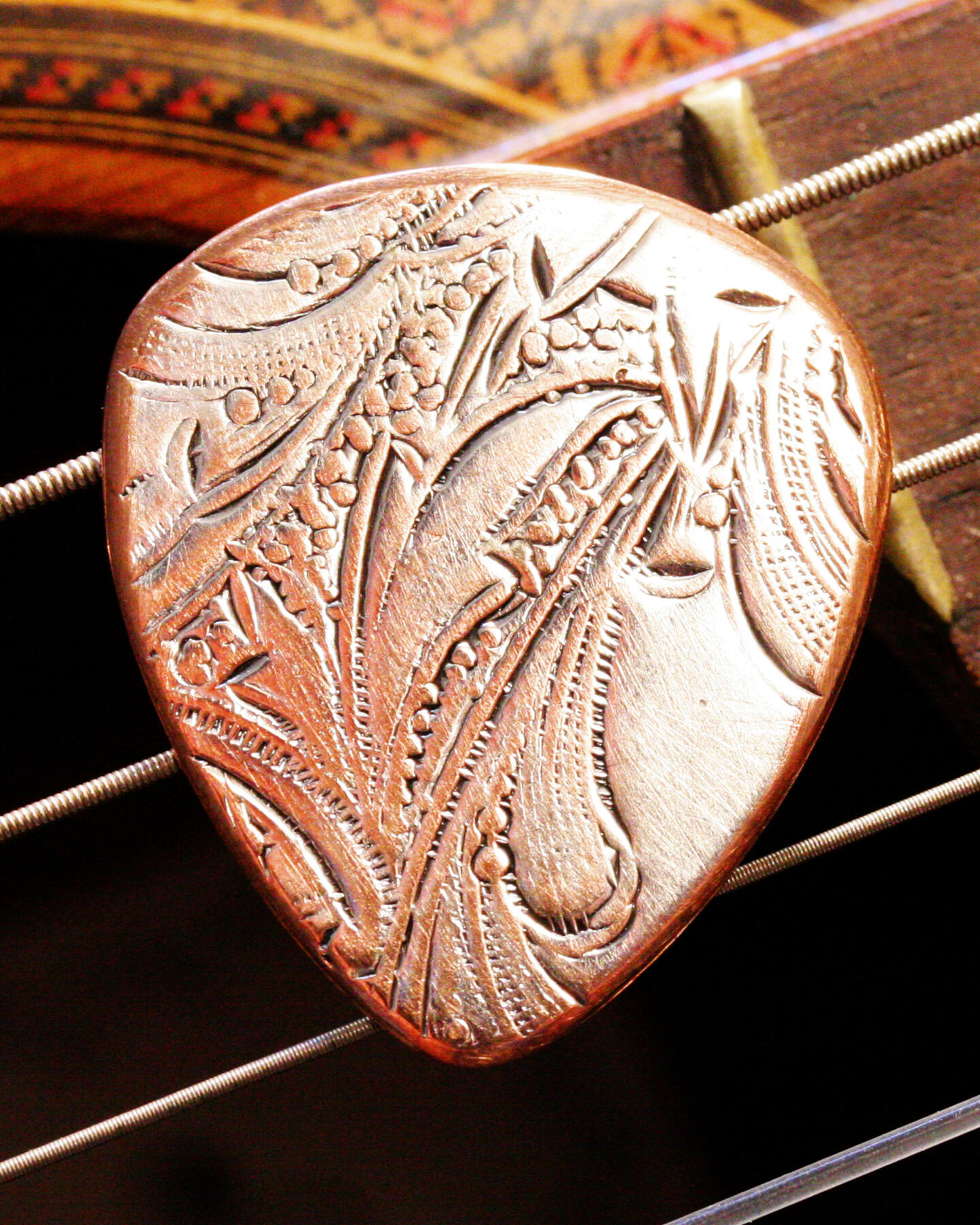 silver copper guitar pick